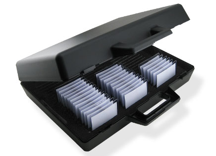 Black plastic case with badge holders inserted into a foam tray.