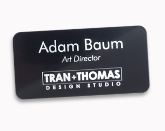 Metal name tag 1.5x3 inches with text and engraved logo